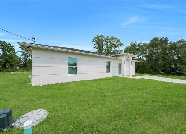 Property at 820 Hibiscus Ave, Lehigh Acres, FL 33972, 3 beds, 2 baths