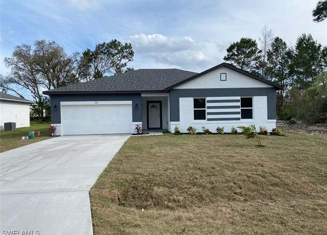 Property at 1021 Milwaukee Blvd, Lehigh Acres, FL 33974, 4 beds, 2 baths