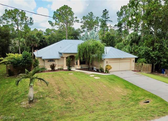 Property at 1040 Asther St E, Lehigh Acres, FL 33974, 4 beds, 2 baths