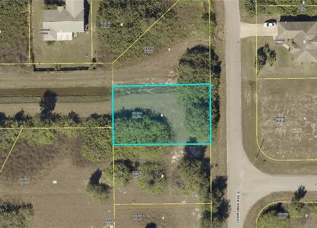 Property at 410 Chamonix Ave S, Lehigh Acres, FL 33974