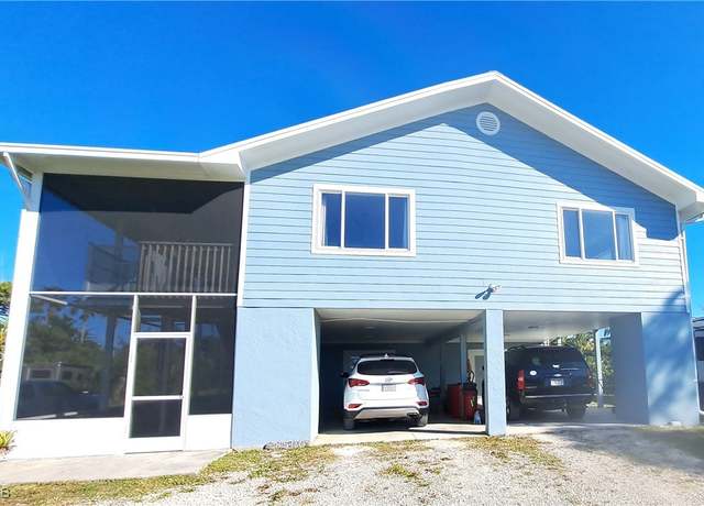 Property at 8500 Redwood Dr, St James City, FL 33956, 4 beds, 3 baths