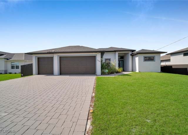 Property at 304 NW 4th Ave, Cape Coral, FL 33993, 4 beds, 3 baths