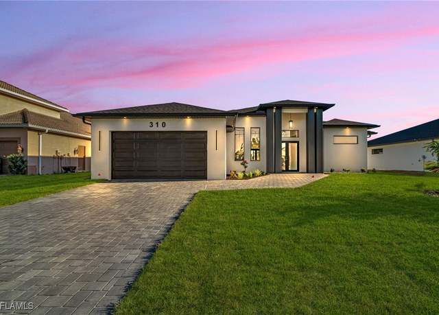 Property at 310 SW 31st Ter, Cape Coral, FL 33914, 4 beds, 4 baths