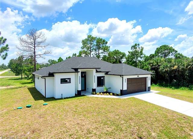 Property at 1254 Ellipse St E, Lehigh Acres, FL 33974, 4 beds, 2.5 baths