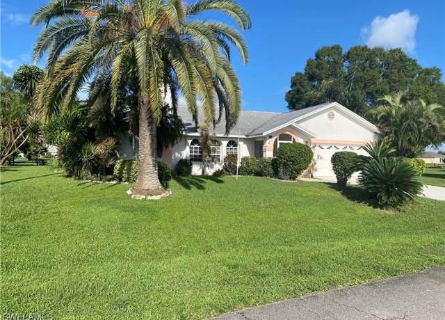 Property at 542 Whispering Wind Bnd, Lehigh Acres, FL 33974, 4 beds, 3 baths