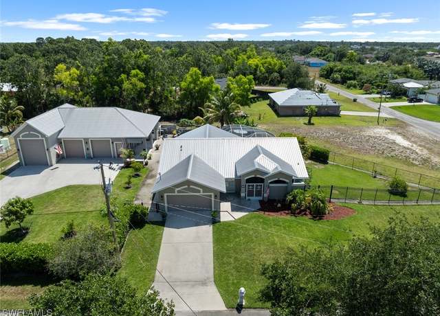 Property at 745 David Laird Ln, Lehigh Acres, FL 33974, 3 beds, 3 baths
