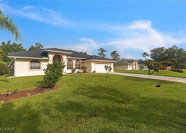 Property at 503 Poinsettia Ave, Lehigh Acres, FL 33972, 4 beds, 3 baths