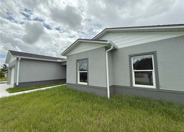 Property at 127 Ocean Park Dr, Lehigh Acres, FL 33972, 4 beds, 3 baths