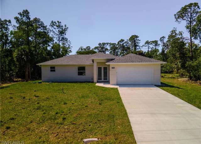 Property at 1034 Summa Blvd, Lehigh Acres, FL 33974, 3 beds, 2 baths