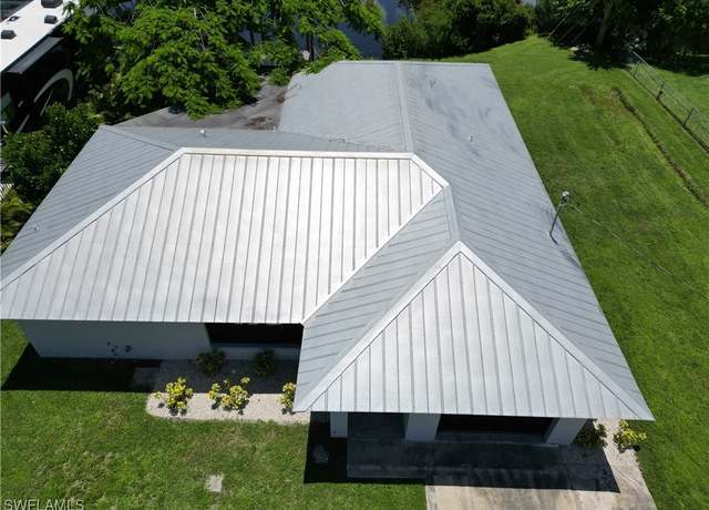Property at 2241 Club House Rd, North Fort Myers, FL 33917, 3 beds, 2 baths