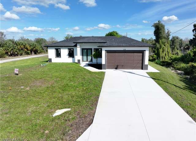Property at 519 Lone Star Ln, Lehigh Acres, FL 33974, 3 beds, 2 baths