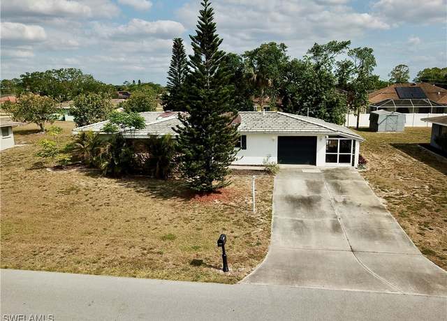 Property at 320 Hollywood St, Lehigh Acres, FL 33936, 3 beds, 2 baths