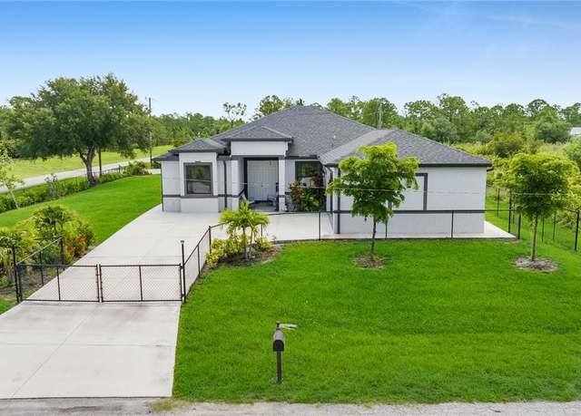 Property at 1124 Robert Ave, Lehigh Acres, FL 33936, 4 beds, 3 baths