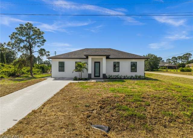 Property at 371 Peerless St, Lehigh Acres, FL 33974, 3 beds, 3 baths
