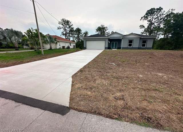 Property at 942 Sunrise Blvd, Lehigh Acres, FL 33974, 4 beds, 3 baths