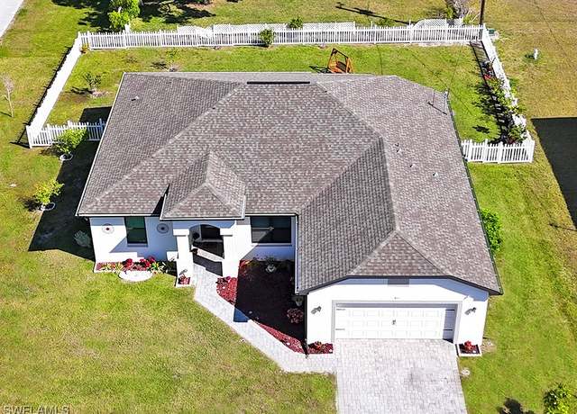 Property at 411 SW 19th Ter, Cape Coral, FL 33991, 4 beds, 2 baths