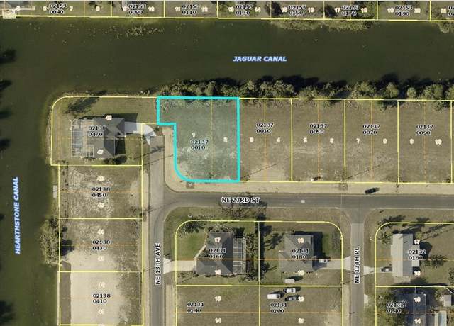 Property at 1303 NE 23rd St, Cape Coral, FL 33909