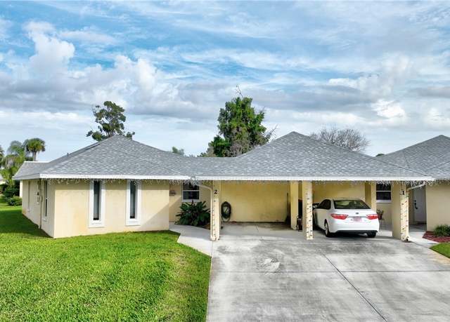 Property at 2 E Greens Cir, Lehigh Acres, FL 33936, 2 beds, 2 baths