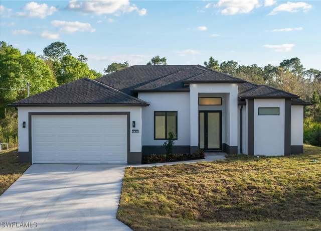 Property at 702 E 13th St, Lehigh Acres, FL 33972, 3 beds, 2 baths