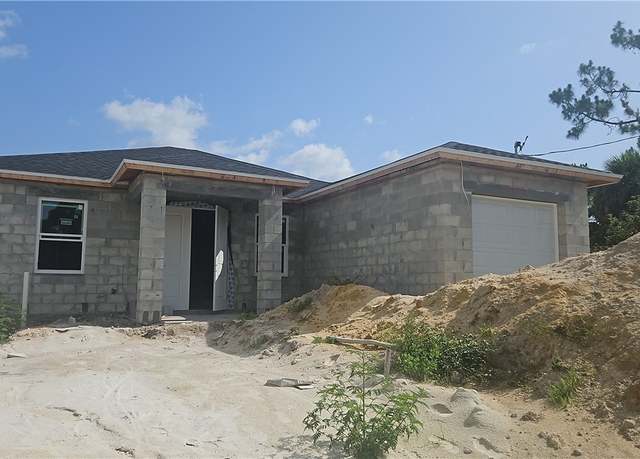 Property at 2505 15th St W, Lehigh Acres, FL 33971, 3 beds, 2 baths