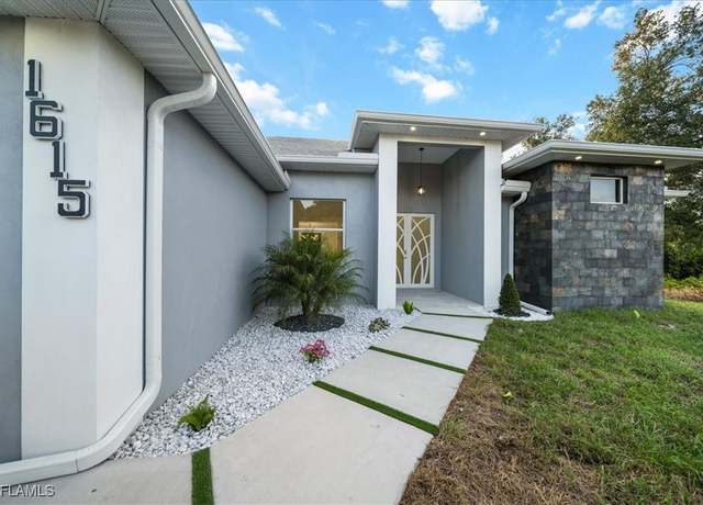 Property at 1615 Richmond Ave N, Lehigh Acres, FL 33972, 4 beds, 3 baths