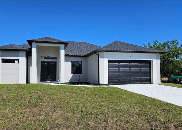 Property at 812 Hibiscus Ave, Lehigh Acres, FL 33972, 4 beds, 2 baths