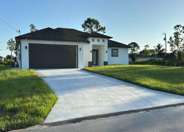Property at 837 Runble St E, Lehigh Acres, FL 33974, 3 beds, 2.5 baths