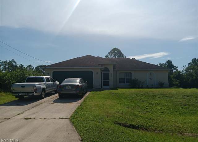 Property at 631 Aspen Ave S, Lehigh Acres, FL 33974, 4 beds, 2 baths
