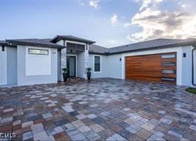 Property at 516 NW 3rd Ter, Cape Coral, FL 33993, 4 beds, 3 baths