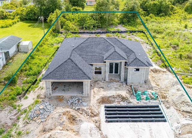 Property at 615 8th Ave, Lehigh Acres, FL 33972, 3 beds, 3 baths