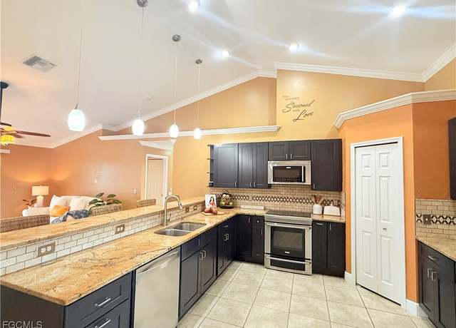 Property at 621 NW 28th Ter, Cape Coral, FL 33993, 3 beds, 2 baths