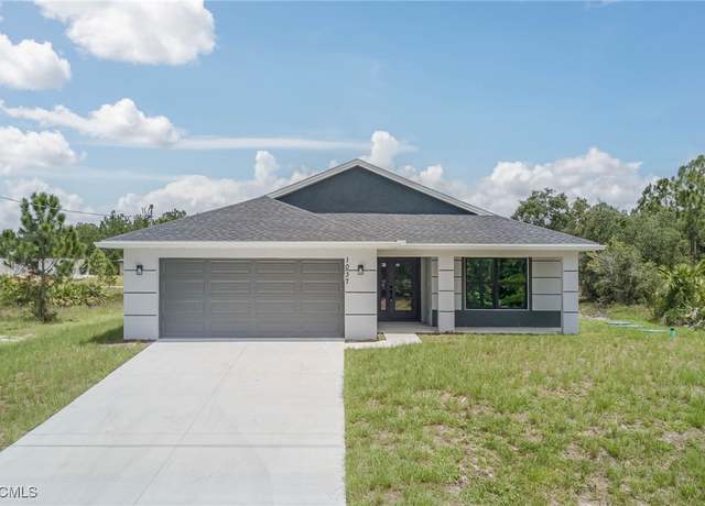 Property at 1037 Cheney Ave S, Lehigh Acres, FL 33974, 3 beds, 2 baths