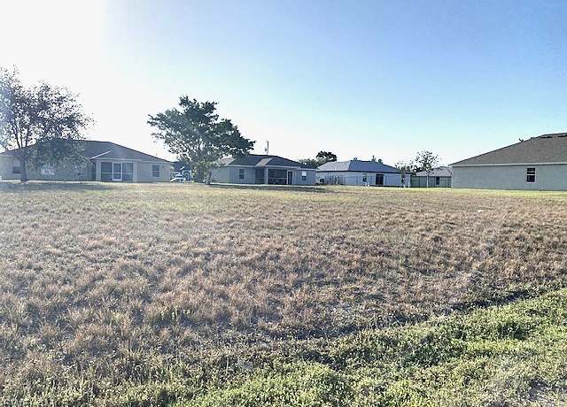 Property at 1704 NE 7th Ave, Cape Coral, FL 33909