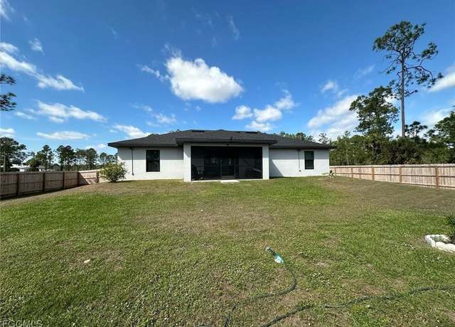 Property at 504 Moore Ave, Lehigh Acres, FL 33972, 4 beds, 2 baths
