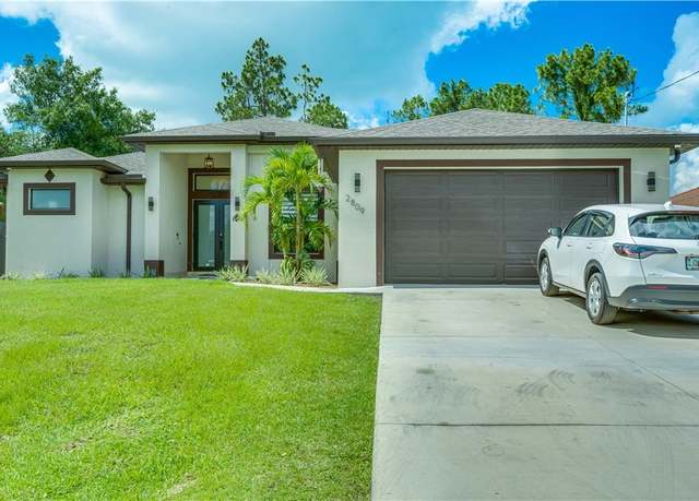 Property at 2809 15th St W, Lehigh Acres, FL 33971, 3 beds, 2 baths