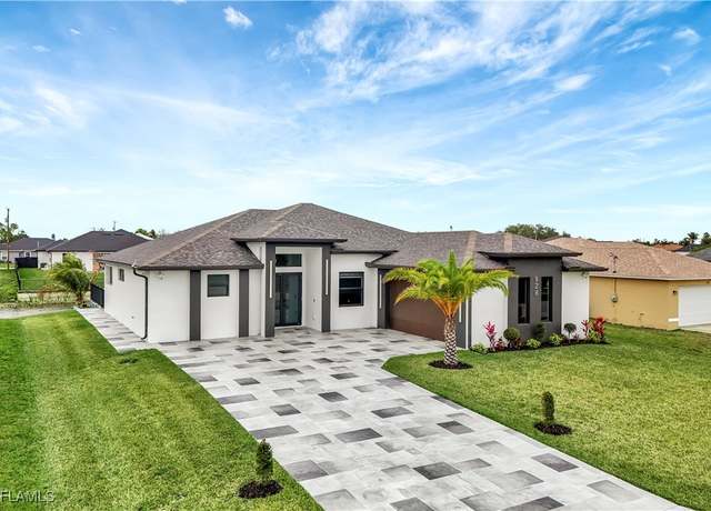 Property at 928 NE 14th Ave, Cape Coral, FL 33909, 3 beds, 3 baths