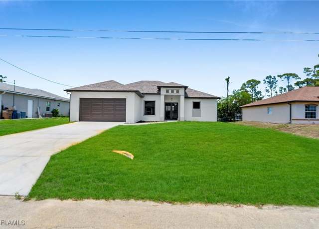 Property at 2512 10th St W, Lehigh Acres, FL 33971, 3 beds, 2 baths