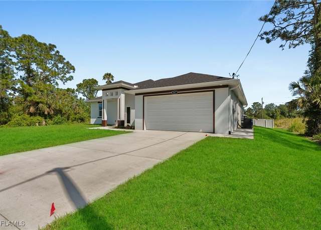 Property at 908 Barcia St E, Lehigh Acres, FL 33974, 4 beds, 2.5 baths