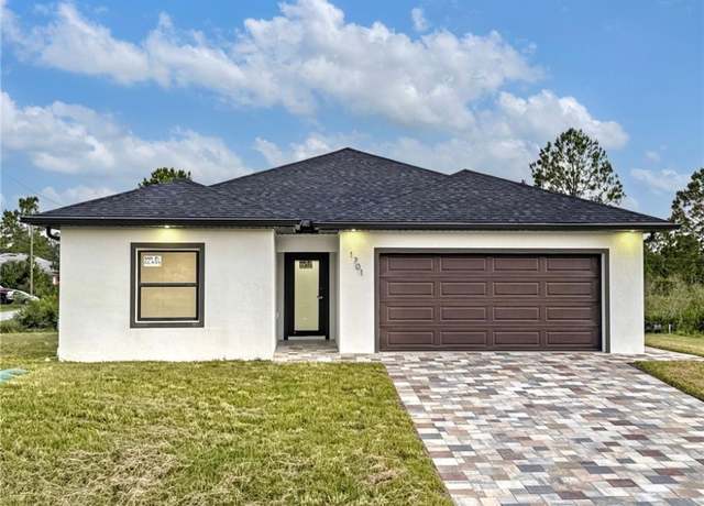 Property at 1701 W 11th St, Lehigh Acres, FL 33972, 3 beds, 2 baths