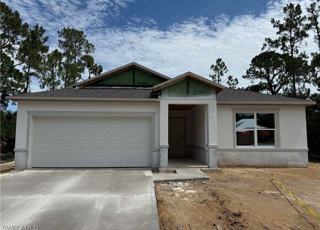 Property at 1039 Asther St E, Lehigh Acres, FL 33974, 4 beds, 2 baths