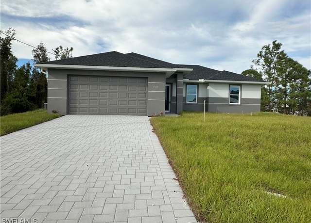 Property at 2608 37th St SW, Lehigh Acres, FL 33976, 3 beds, 2 baths