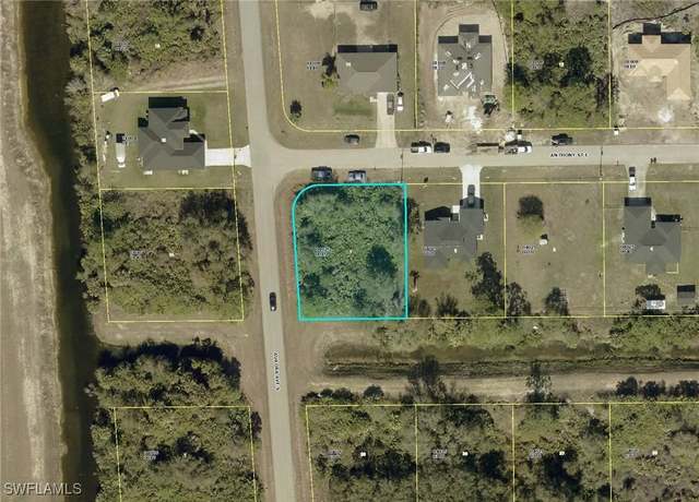 Property at 910 Anthony St E, Lehigh Acres, FL 33974
