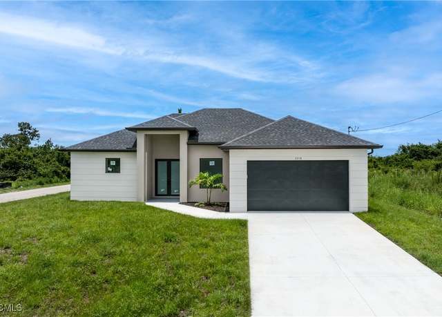 Property at 3318 30th St SW, Lehigh Acres, FL 33976, 3 beds, 2.5 baths