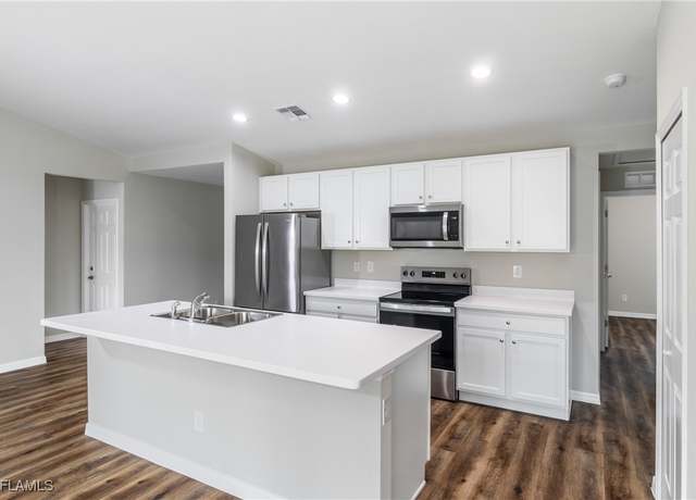Property at 2605 NE 6th Pl, Cape Coral, FL 33909, 4 beds, 2 baths