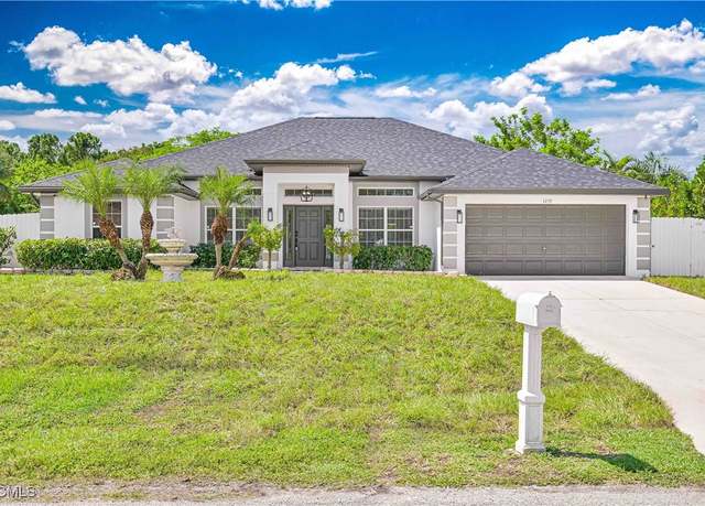 Property at 1210 Albemarle Cir, Lehigh Acres, FL 33936, 4 beds, 2 baths