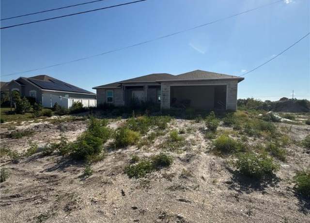 Property at 2213 NE 5th Pl, Cape Coral, FL 33909, 4 beds, 3 baths