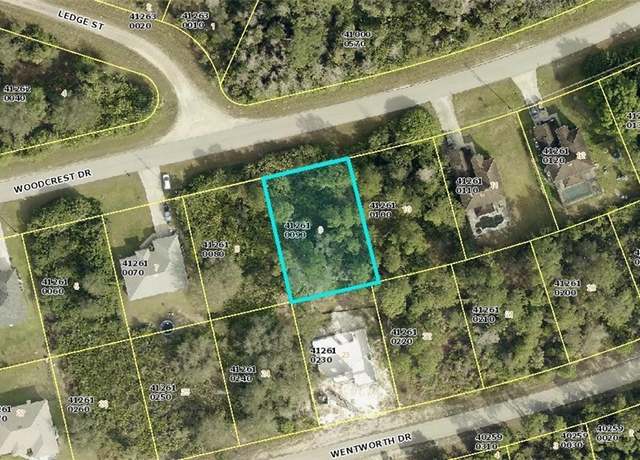 Property at 665 Woodcrest Dr, Lehigh Acres, FL 33972