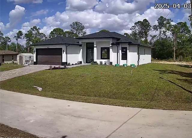 Property at 402 Irving Ave, Lehigh Acres, FL 33972, 4 beds, 2 baths