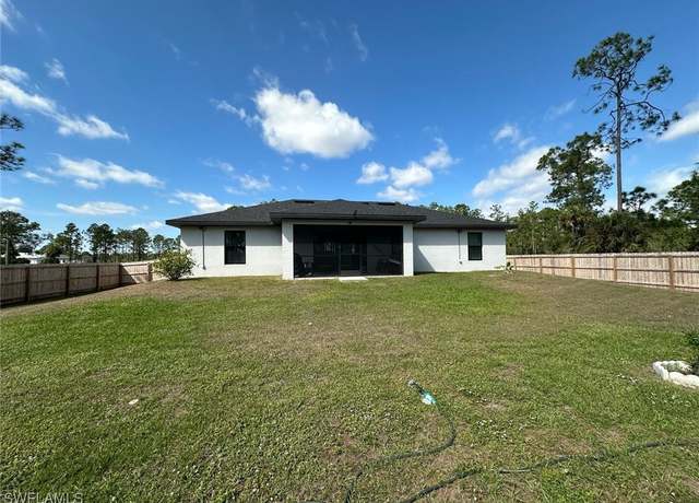 Property at 504 Moore Ave, Lehigh Acres, FL 33972, 4 beds, 2 baths