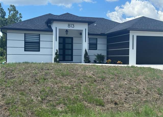 Property at 813 Porter St E, Lehigh Acres, FL 33974, 3 beds, 2 baths